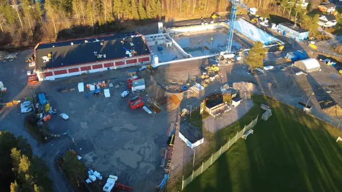 Flygvy över byggområde. 